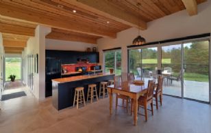 Kitchen & Dining Rooms walk-out to deck - Country homes for sale and luxury real estate including horse farms and property in the Caledon and King City areas near Toronto