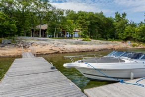 Cottage Approach from Water - Country homes for sale and luxury real estate including horse farms and property in the Caledon and King City areas near Toronto