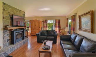 Living Room and Fireplace - Country homes for sale and luxury real estate including horse farms and property in the Caledon and King City areas near Toronto