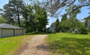 House and Garage - Country homes for sale and luxury real estate including horse farms and property in the Caledon and King City areas near Toronto