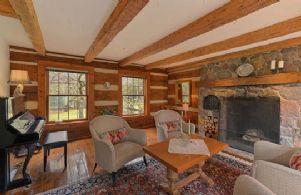 Living Room with Massive Fieldstone Fireplace - Country homes for sale and luxury real estate including horse farms and property in the Caledon and King City areas near Toronto