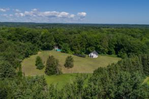 House Overlooking Pool & Stable - Country homes for sale and luxury real estate including horse farms and property in the Caledon and King City areas near Toronto