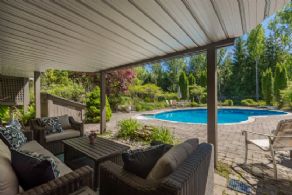 Shaded seating area by pool - Country homes for sale and luxury real estate including horse farms and property in the Caledon and King City areas near Toronto