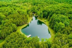 Aerial of Pond - Country homes for sale and luxury real estate including horse farms and property in the Caledon and King City areas near Toronto