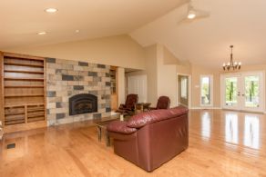 Family Room with Fireplace - Country homes for sale and luxury real estate including horse farms and property in the Caledon and King City areas near Toronto