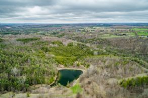 North Pond with barn in distance - Country homes for sale and luxury real estate including horse farms and property in the Caledon and King City areas near Toronto