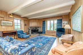 Family Room with Fieldstone Fireplace & Walk-out to Garden - Country homes for sale and luxury real estate including horse farms and property in the Caledon and King City areas near Toronto