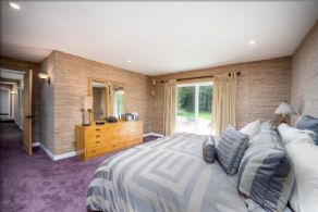 Primary bedroom with en suite bathroom and walk-in closet - Country homes for sale and luxury real estate including horse farms and property in the Caledon and King City areas near Toronto