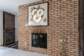 Kitchen Fireplace - Country homes for sale and luxury real estate including horse farms and property in the Caledon and King City areas near Toronto