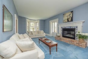 Living Room Gas Fireplace - Country homes for sale and luxury real estate including horse farms and property in the Caledon and King City areas near Toronto