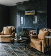Seating area with fireplace in kitchen - Country homes for sale and luxury real estate including horse farms and property in the Caledon and King City areas near Toronto