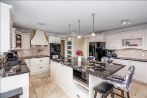 Kitchen with walk-out to garden - Country homes for sale and luxury real estate including horse farms and property in the Caledon and King City areas near Toronto