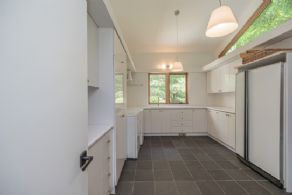 Mudroom with main floor laundry - Country homes for sale and luxury real estate including horse farms and property in the Caledon and King City areas near Toronto