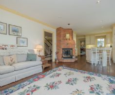 Sitting Room alongside Kitchen with Fireplace - Country homes for sale and luxury real estate including horse farms and property in the Caledon and King City areas near Toronto