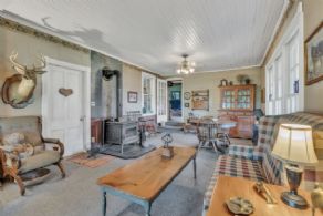 Living Room with Woodstove - Country homes for sale and luxury real estate including horse farms and property in the Caledon and King City areas near Toronto