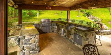 Outdoor Kitchen alongside Waterfall - Country homes for sale and luxury real estate including horse farms and property in the Caledon and King City areas near Toronto