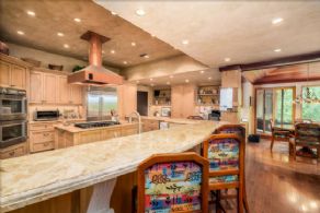 Kitchen with Breakfast Bar - Country homes for sale and luxury real estate including horse farms and property in the Caledon and King City areas near Toronto