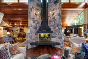 4-sided Stone Fireplace - Country homes for sale and luxury real estate including horse farms and property in the Caledon and King City areas near Toronto