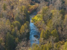 River flowing through the southern portion of the property - Country homes for sale and luxury real estate including horse farms and property in the Caledon and King City areas near Toronto