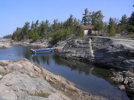 Telos Island, Snug Harbour Carling Township - Country homes for sale and luxury real estate including horse farms and property in the Caledon and King City areas near Toronto