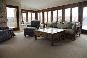 Family Room with Fireplace and Deck - Country homes for sale and luxury real estate including horse farms and property in the Caledon and King City areas near Toronto