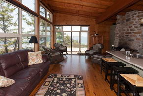 Main Cottage Kitchen/living w/stone fireplace - Country homes for sale and luxury real estate including horse farms and property in the Caledon and King City areas near Toronto