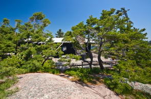 Exterior Main Cottage and Deck - Country homes for sale and luxury real estate including horse farms and property in the Caledon and King City areas near Toronto