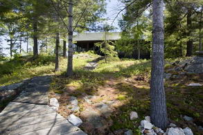 View to cottage from dock - Country homes for sale and luxury real estate including horse farms and property in the Caledon and King City areas near Toronto