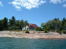 The cottage, sited with commanding views of the surrounding islands, has the charm and flavour of vintage Georgian Bay.  - Country homes for sale and luxury real estate including horse farms and property in the Caledon and King City areas near Toronto