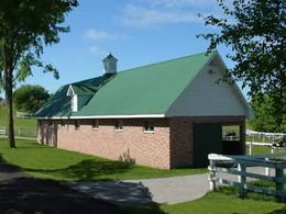 Isolation Barn - Brick construction. 6 box stalls - Country homes for sale and luxury real estate including horse farms and property in the Caledon and King City areas near Toronto